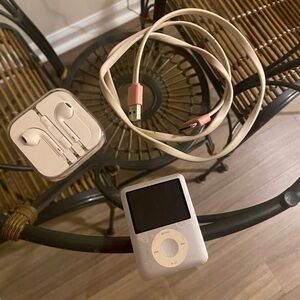Apple iPod Nano with White Earbuds and charging Cable